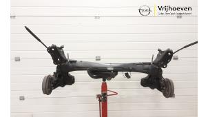 Used Rear-wheel drive axle Opel Corsa F (UB/UH/UP) 1.2 12V 75 Price € 250,00 Margin scheme offered by Autodemontage Vrijhoeven B.V.