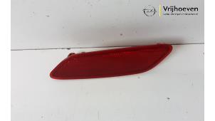 Used Rear bumper reflector, right Opel Corsa F (UB/UP) 1.2 12V 75 Price € 10,00 Margin scheme offered by Autodemontage Vrijhoeven B.V.