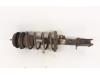 Fronts shock absorber, left from a Opel Corsa C (F08/68), 2000 / 2009 1.0 12V Twin Port, Hatchback, Petrol, 998cc, 44kW (60pk), FWD, Z10XEP; EURO4, 2003-06 / 2009-12 2006