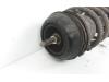Fronts shock absorber, left from a Opel Corsa C (F08/68) 1.0 12V Twin Port 2006