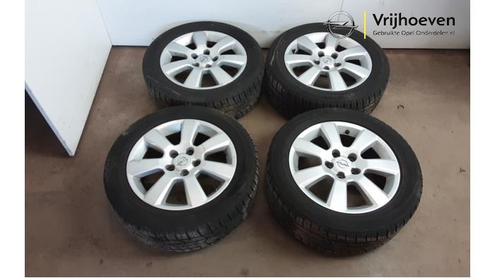 Set of wheels + tyres from a Opel Vectra C Caravan 2.2 DIG 16V 2004