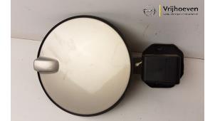 Used Tank cap cover Opel Astra H (L48) 1.6 16V Twinport Price € 15,00 Margin scheme offered by Autodemontage Vrijhoeven B.V.