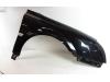 Front wing, right from a Opel Vectra C Caravan 2.2 DIG 16V 2005