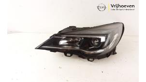 Used Headlight, left Opel Astra K 1.0 SIDI Turbo 12V Price € 480,00 Margin scheme offered by Autodemontage Vrijhoeven B.V.