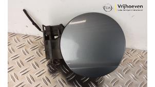 Used Tank cap cover Opel Adam 1.4 16V Price € 30,00 Margin scheme offered by Autodemontage Vrijhoeven B.V.