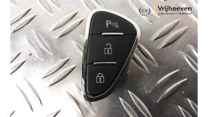 Used Central locking switch Opel Adam 1.4 16V Price € 10,00 Margin scheme offered by Autodemontage Vrijhoeven B.V.