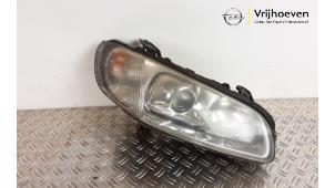 Used Headlight, right Opel Omega B (25/26/27) 2.0i 16V Price € 50,00 Margin scheme offered by Autodemontage Vrijhoeven B.V.