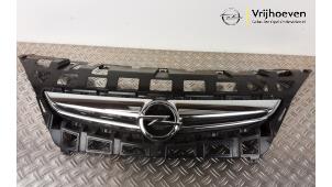Used Grille Opel Astra J GTC (PD2/PF2) 1.4 Turbo 16V ecoFLEX 120 Price € 84,70 Inclusive VAT offered by Autodemontage Vrijhoeven B.V.