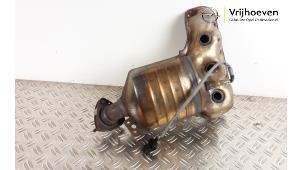 Used Exhaust manifold + catalyst Opel Corsa E 1.4 16V Price € 250,00 Margin scheme offered by Autodemontage Vrijhoeven B.V.