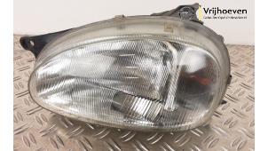 Used Headlight, left Opel Corsa B (73/78/79) 1.0i 12V Price € 10,00 Margin scheme offered by Autodemontage Vrijhoeven B.V.