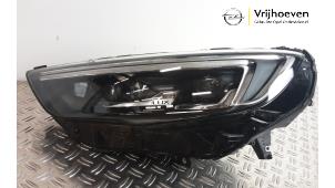 Używane Reflektor lewy Opel Insignia Sports Tourer 1.5 Turbo 16V 165 Cena € 900,00 Procedura marży oferowane przez Autodemontage Vrijhoeven B.V.