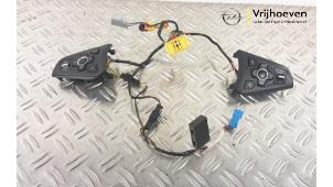 Used Steering wheel mounted radio control Opel Astra K 1.0 Turbo 12V Price € 40,00 Margin scheme offered by Autodemontage Vrijhoeven B.V.