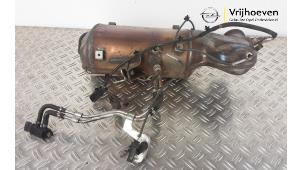 Used Particulate filter Opel Astra J Sports Tourer (PD8/PE8/PF8) 1.6 CDTI 16V Price € 550,00 Margin scheme offered by Autodemontage Vrijhoeven B.V.