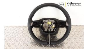 Used Steering wheel Opel Astra L (F3/FB/FM/FP) 1.2 Turbo 110 12V Price € 350,00 Margin scheme offered by Autodemontage Vrijhoeven B.V.