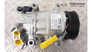 Used Air conditioning pump Opel Astra L (F3/FB/FM/FP) 1.2 Turbo 110 12V Price € 200,00 Margin scheme offered by Autodemontage Vrijhoeven B.V.