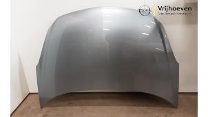 Używane Maska Opel Corsa D 1.2 16V Cena € 150,00 Procedura marży oferowane przez Autodemontage Vrijhoeven B.V.
