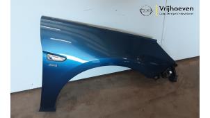 Used Front wing, right Opel Astra K 1.0 SIDI Turbo 12V Price € 200,00 Margin scheme offered by Autodemontage Vrijhoeven B.V.