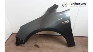 Used Front wing, left Opel Astra J (PC6/PD6/PE6/PF6) 1.4 Turbo 16V Price € 125,00 Margin scheme offered by Autodemontage Vrijhoeven B.V.