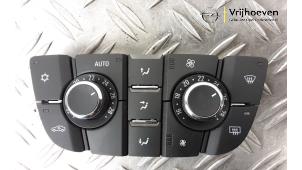 Usados Panel de control de calefacción Opel Astra J Sports Tourer (PD8/PE8/PF8) 1.6 Turbo 16V Precio € 60,00 Norma de margen ofrecido por Autodemontage Vrijhoeven B.V.