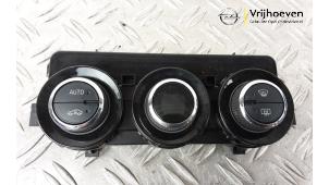 Usados Panel de control de calefacción Opel Adam 1.2 16V Precio € 40,00 Norma de margen ofrecido por Autodemontage Vrijhoeven B.V.