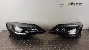 Usagé Kit phares gauche + droite Opel Astra K Sports Tourer 1.0 Turbo 12V Prix € 600,00 Règlement à la marge proposé par Autodemontage Vrijhoeven B.V.