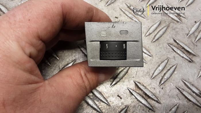 Seat heating switch