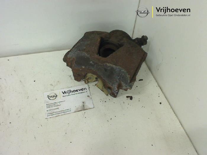 Front brake calliper, left from a Opel Astra F (53/54/58/59) 1.6i 16V 1996