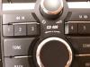 Radio control panel from a Opel Meriva 1.4 Turbo 16V LPG ecoFLEX 2011