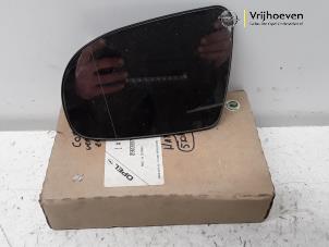 New Mirror glass, left Opel Corsa Price € 18,15 Inclusive VAT offered by Autodemontage Vrijhoeven B.V.