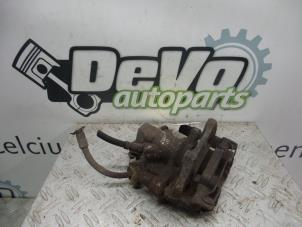 Używane Zacisk hamulcowy lewy tyl Austin Mini Open (R52) 1.6 16V One Cena na żądanie oferowane przez DeVo Autoparts