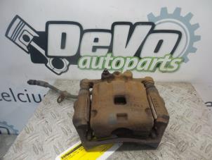 Used Front brake calliper, right Ford Fiesta 6 (JA8) 1.25 16V Price on request offered by DeVo Autoparts