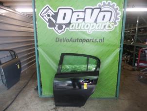 Used Rear door 4-door, left Opel Corsa D 1.0 Price on request offered by DeVo Autoparts