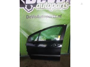 Used Door 4-door, front left Peugeot 308 (4A/C) 1.4 VTI 16V Price on request offered by DeVo Autoparts