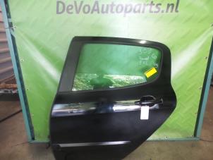Used Rear door 4-door, left Peugeot 308 (4A/C) 1.4 VTI 16V Price on request offered by DeVo Autoparts