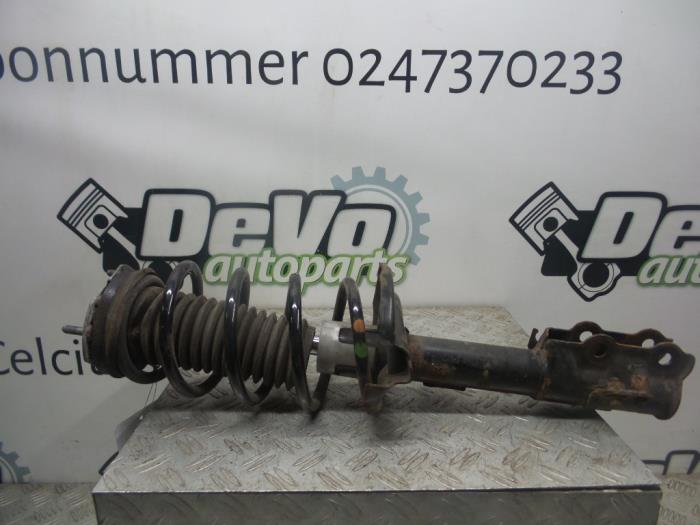 Front shock absorber rod, left from a Ford Fiesta 6 (JA8) 1.4 TDCi 2012