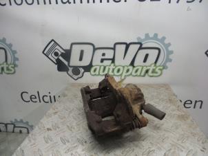 Used Front brake calliper, right Peugeot 308 (4A/C) 1.6 VTI 16V Price on request offered by DeVo Autoparts