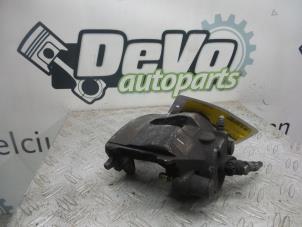 Used Front brake calliper, right Volkswagen Golf VII (AUA) 1.4 TSI 16V Price on request offered by DeVo Autoparts