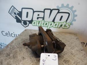 Used Front brake calliper, left Renault Megane III Coupe (DZ) 1.6 16V Price on request offered by DeVo Autoparts