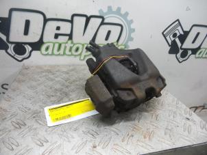 Used Front brake calliper, left BMW 3 serie (E90) 320d 16V Price on request offered by DeVo Autoparts