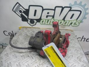 Used Rear brake calliper, left Volkswagen Golf VII (AUA) Price on request offered by DeVo Autoparts