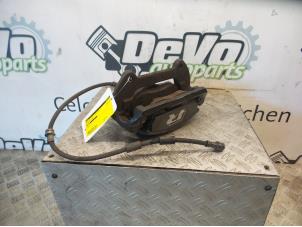 Used Front brake calliper, left Volkswagen Golf VII Variant (AUVV) Price on request offered by DeVo Autoparts