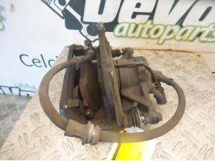 Used Front brake calliper, right Volkswagen Golf VII Variant (AUVV) Price on request offered by DeVo Autoparts