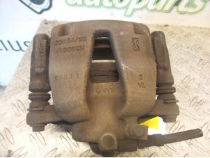 Used Front brake calliper, right Opel Corsa D 1.2 16V ecoFLEX Bi-Fuel Price on request offered by DeVo Autoparts
