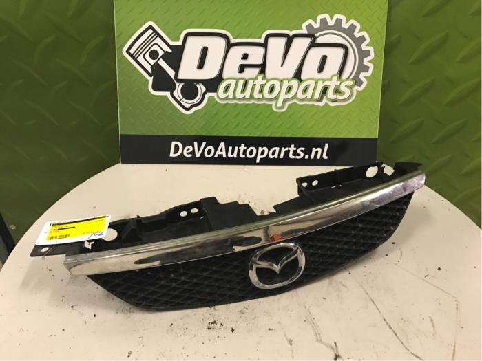 Używane Grill Mazda 323 Fastbreak (BJ14) 2.0 DiTD 16V Cena na żądanie oferowane przez DeVo Autoparts