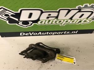Used Front brake calliper, right Opel Corsa C (F08/68) 1.2 16V Twin Port Price on request offered by DeVo Autoparts