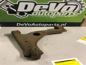 Usagé Bras de suspension avant gauche Opel Astra H (L48) 1.4 16V Twinport Prix sur demande proposé par DeVo Autoparts
