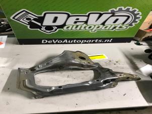 Used Headlight frame, left Opel Corsa C (F08/68) 1.2 16V Price on request offered by DeVo Autoparts