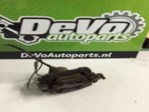 Used Front brake calliper, right Mercedes C (W203) 2.0 C-180 16V Price on request offered by DeVo Autoparts