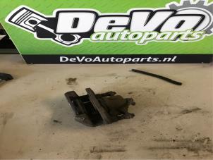 Used Front brake calliper, right Ford Fiesta 6 (JA8) 1.6 TDCi 16V 95 Price on request offered by DeVo Autoparts