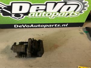Used Front brake calliper, right Opel Corsa D 1.4 16V Twinport Price on request offered by DeVo Autoparts